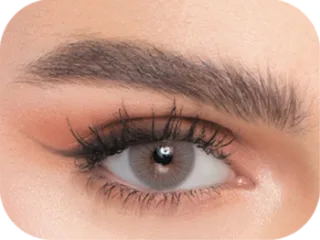 Close-up of an eye wearing Natural colored contact lenses