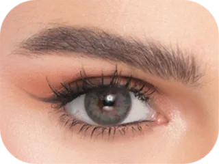 Close-up of an eye wearing Naturèl colored contact lenses