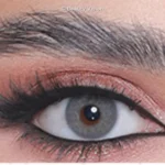 Close-up of an eye wearing 3D Colors Blue colored contact lenses