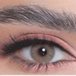 Close-up of an eye wearing 3D Colors Bronze colored contact lenses