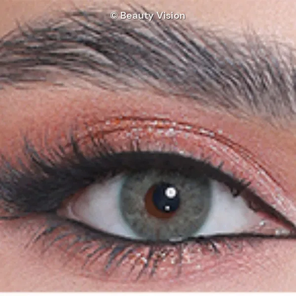 3D Colors 3D Green colored contact lens, close-up on the eye