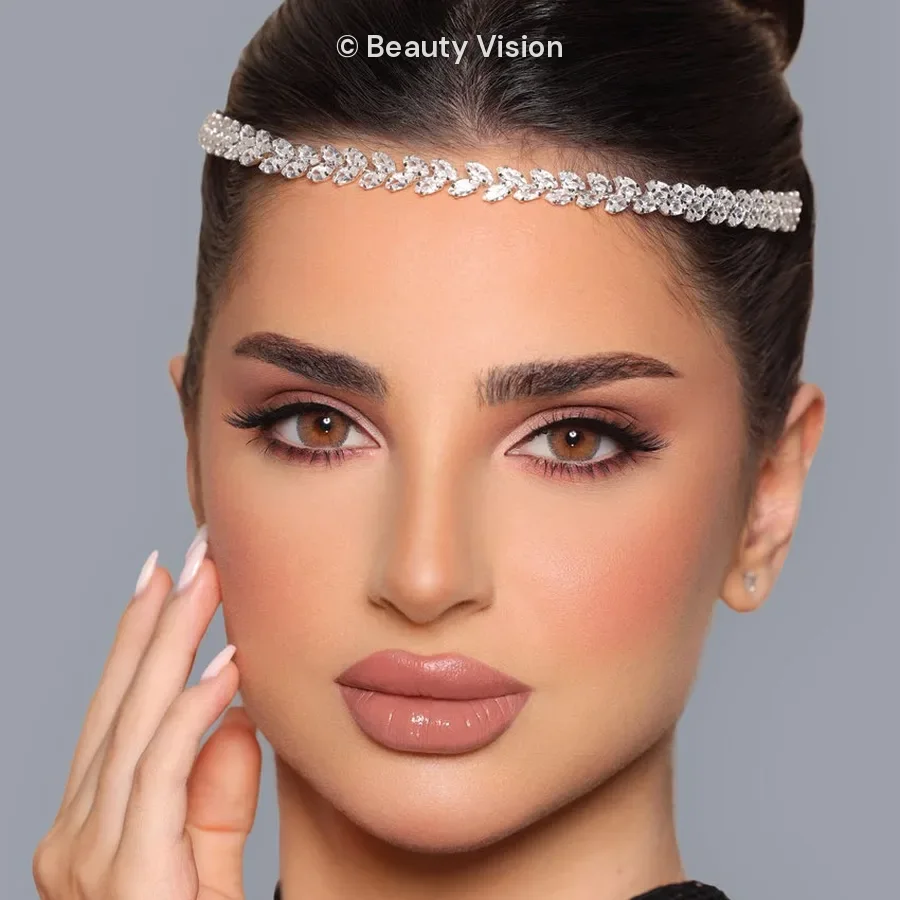 Model wearing Luminous Latin Brown colored contact lenses