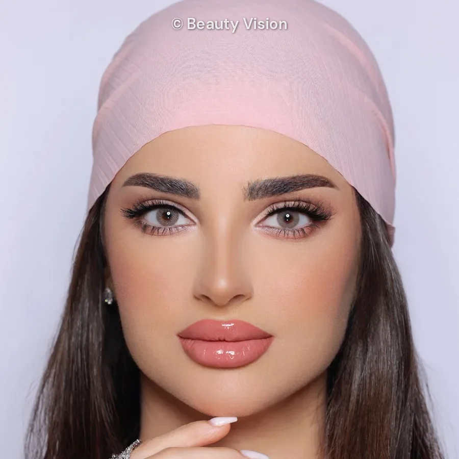 Model wearing Luminous Latte colored contact lenses