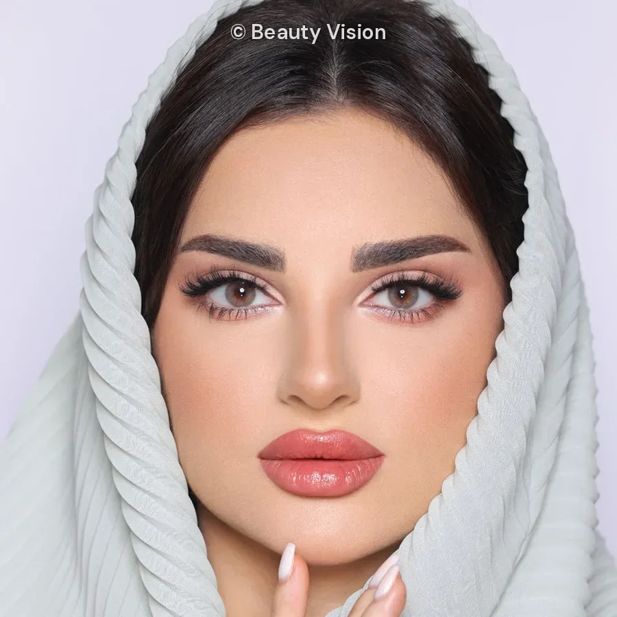 Model wearing Luminous Mocha colored contact lenses