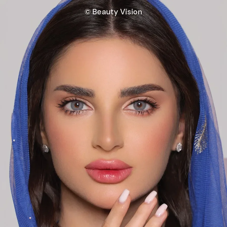 Model wearing Luminous River colored contact lenses