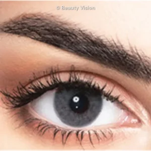 Perla Smoky Gray colored contact lens on the eye