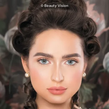 Model wearing Naturèl Core Blue colored contact lenses