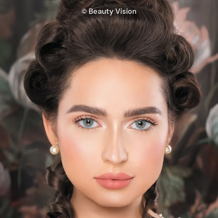Model wearing Naturèl Core Blue colored contact lenses