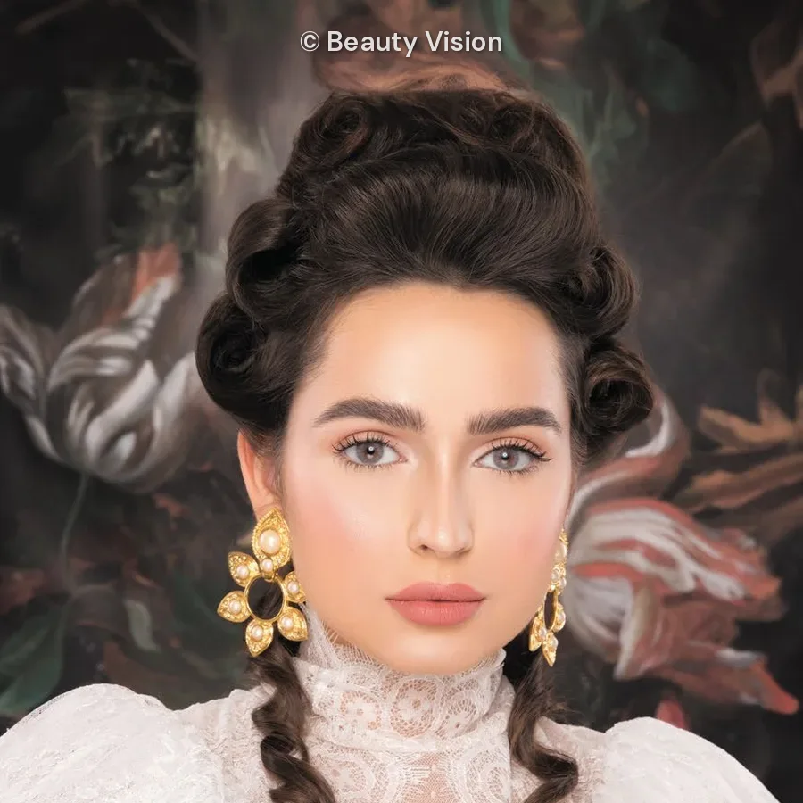 Model wearing Naturèl Core Gray colored contact lenses