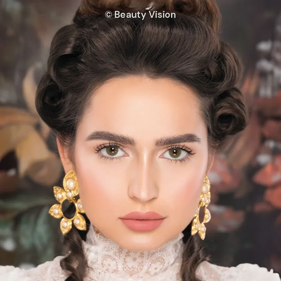Model wearing Naturèl Core Green colored contact lenses