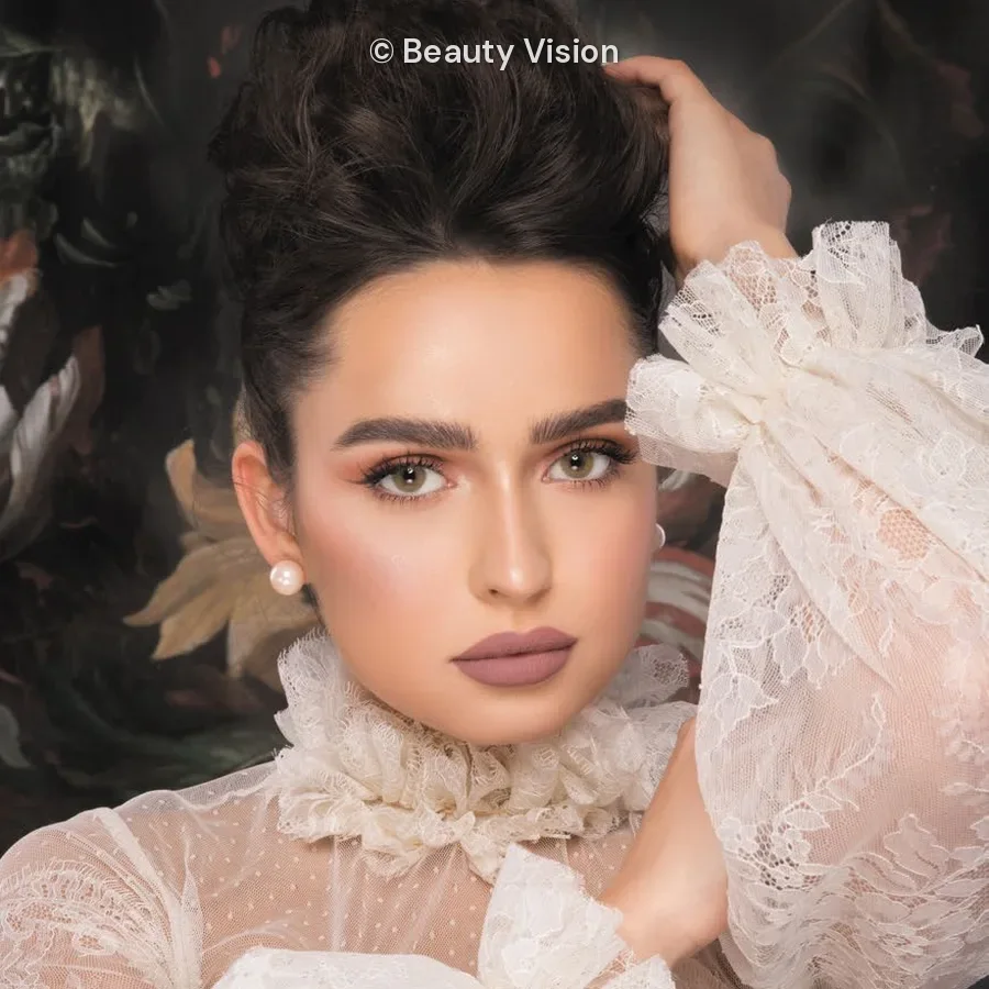 Model wearing Naturèl Core Jade colored contact lenses