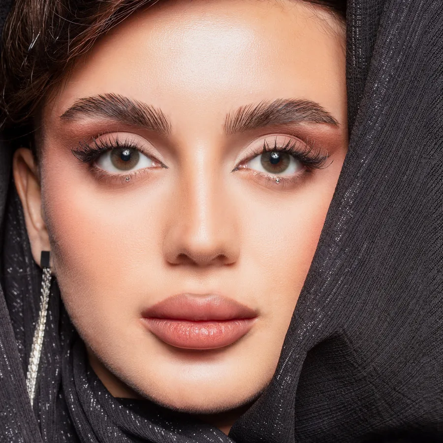 Model wearing Elite Avocado colored contact lenses