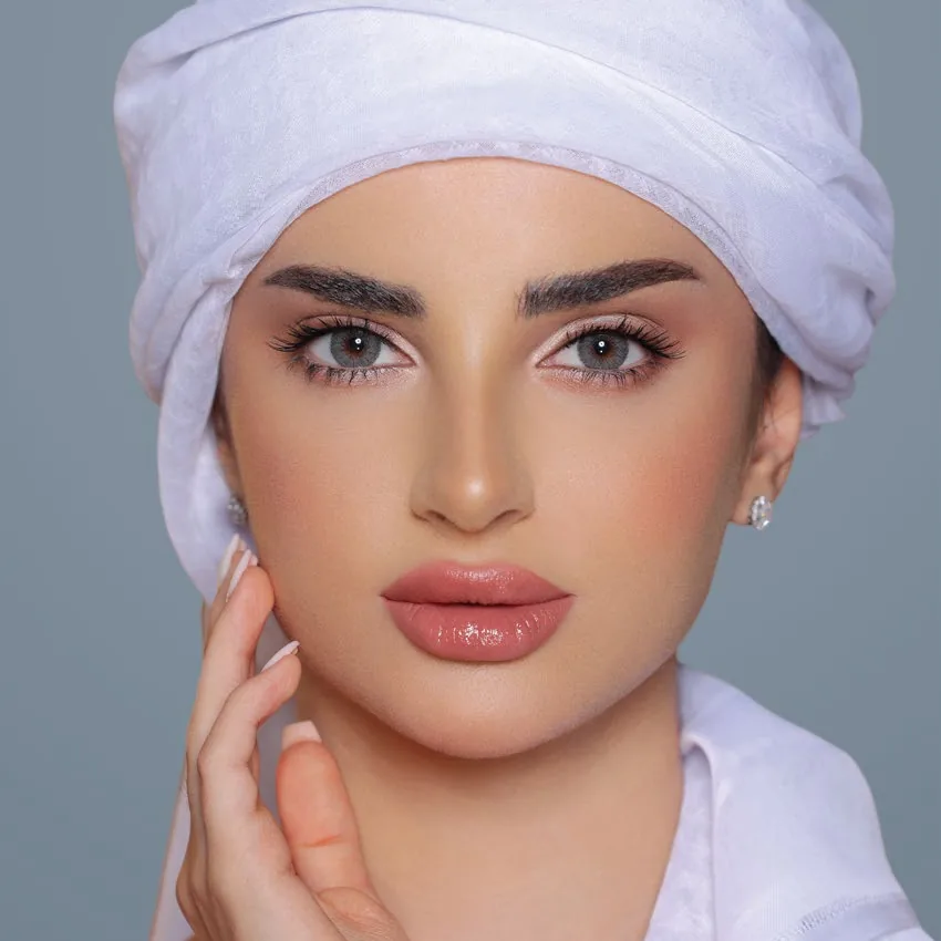 Model wearing Luminous Amber colored contact lenses