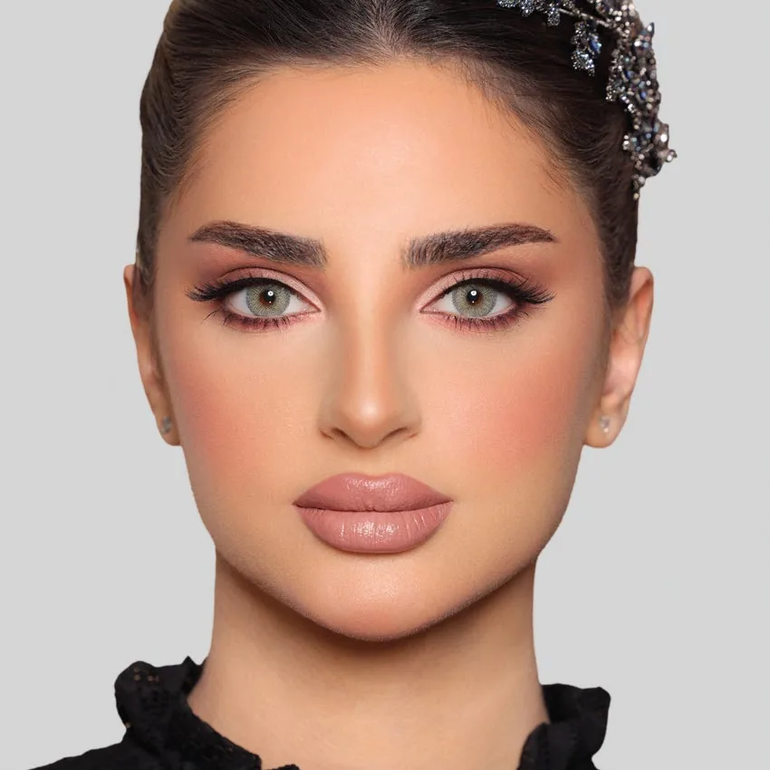 Model wearing Luminous Cloud colored contact lenses