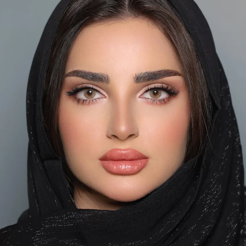 Model wearing Luminous Hazel colored contact lenses