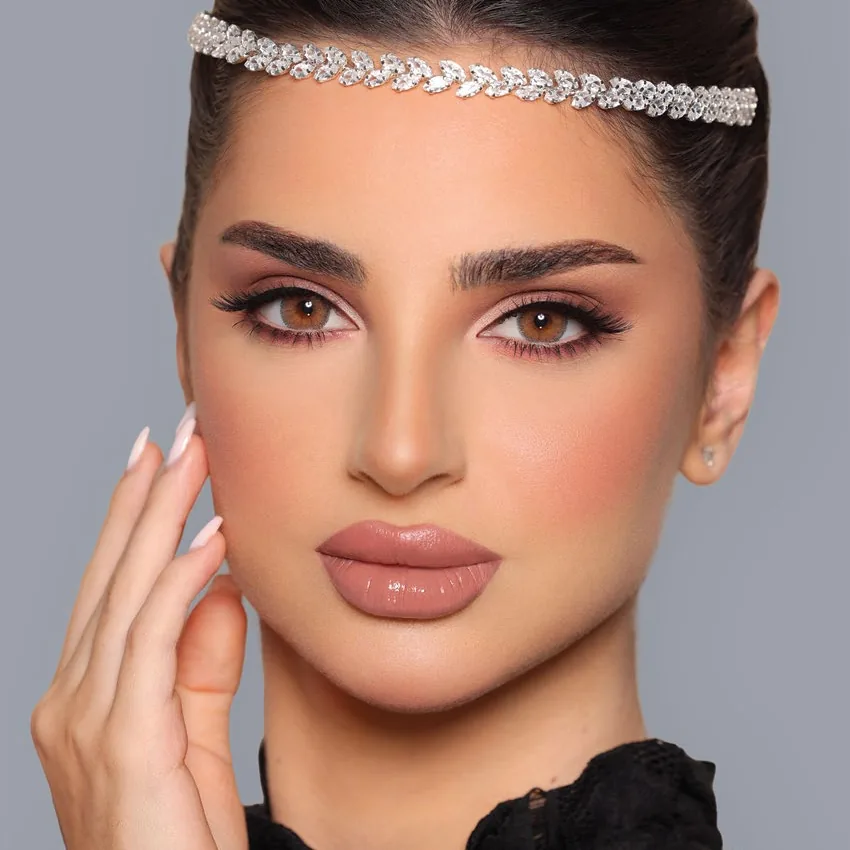 Model wearing Luminous Latin Brown colored contact lenses