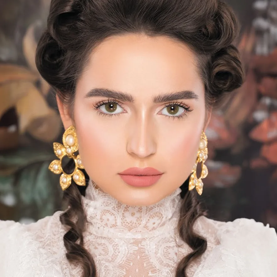 Model wearing Naturèl Core Green colored contact lenses