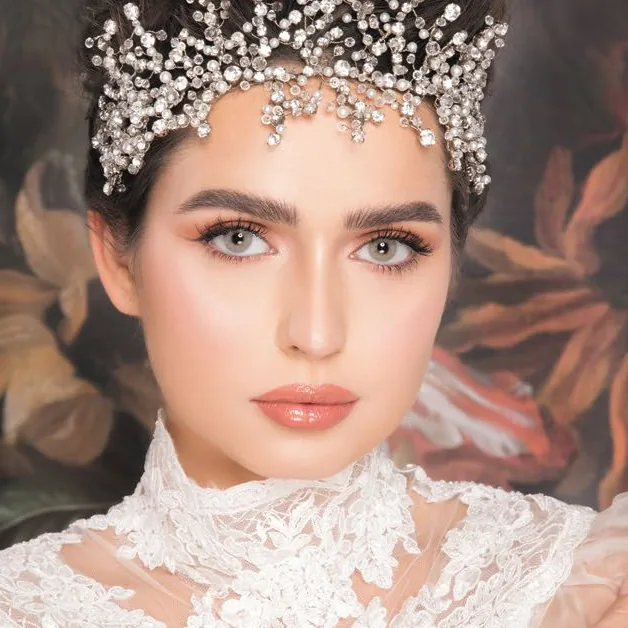 Model wearing Naturèl Core Ivory colored contact lenses