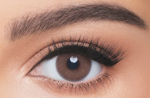 Wonder Look Blonde colored contact lens, close-up on the eye